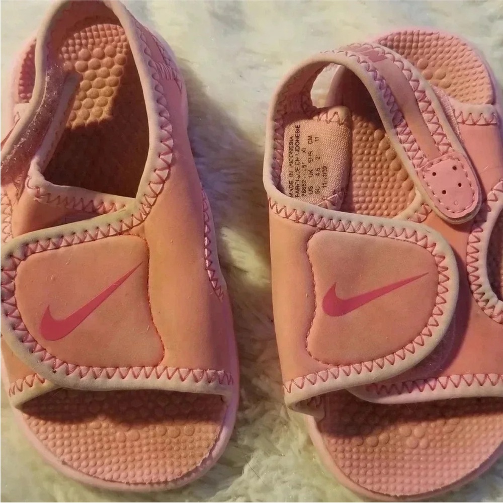 Nike Pink Sandals with Adjustable Straps and Textured Footbed